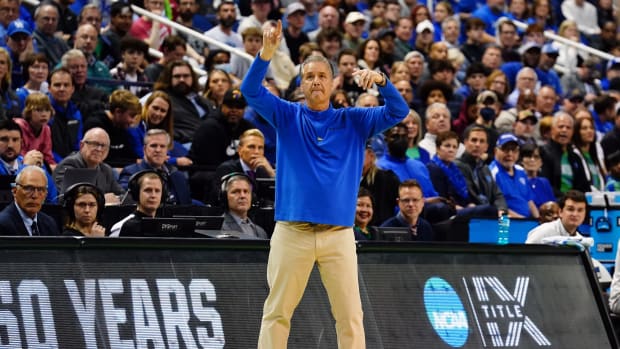 Mar 17, 2023; Greensboro, NC, USA; Kentucky Wildcats head coach John Calipari reacts in the first half against the Providence Friars at Greensboro Coliseum. Mandatory Credit: John David Mercer-USA TODAY Sports